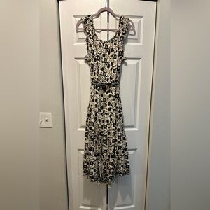 It has pockets!! Max Studio Black and Cream Floral Maxi Dress